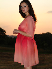 Newcomer Lucie strips outdoors baring her sweet tits and trimmed pussy.