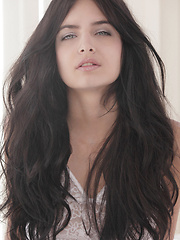 Tanned teen shows her small tits