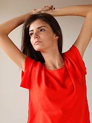 Sunshine A posing naked in her red hot stiletto heels.