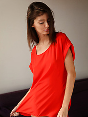 Sunshine A posing naked in her red hot stiletto heels.