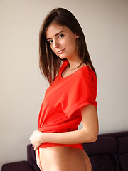 Sunshine A posing naked in her red hot stiletto heels.