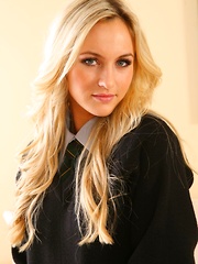 Blonde strips out of her college uniform in the lounge.