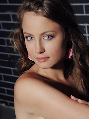 Milana is an alluring beauty with daring   personality, and enviable figure with smooth and   puffy bits, posing sensually all over the sofa.
